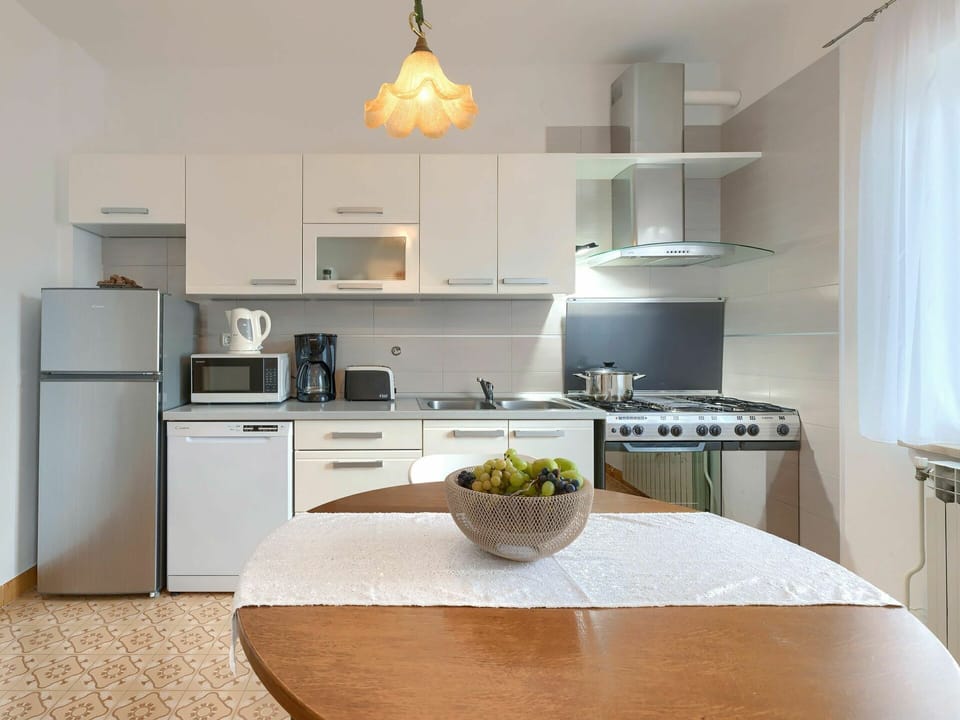 Cabinetry, Countertop, Furniture, Property, White, Kitchen Stove, Kitchen, Table, Home Appliance, Wood