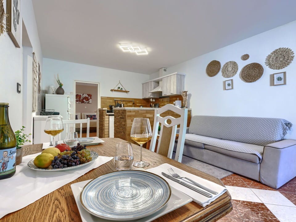 Furniture, Interior Design, Flooring, Room, Floor, Wood, Ceiling, Couch, Table, Chair