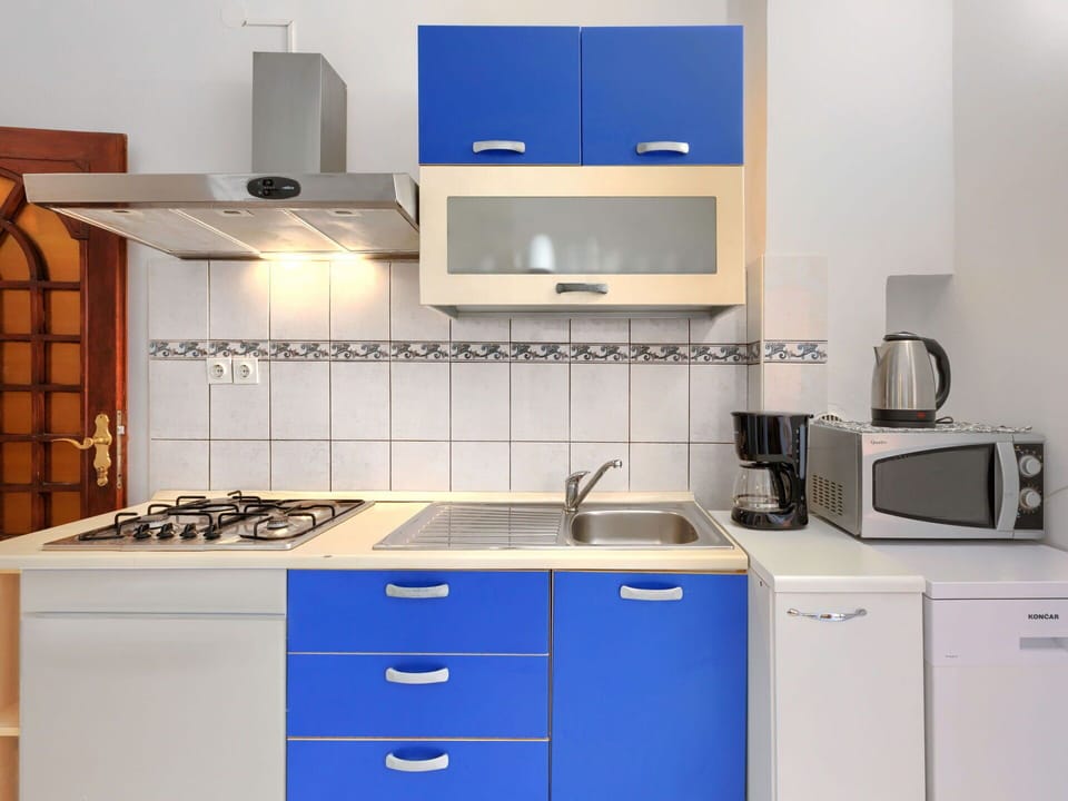 Blue, Kitchen, Major Appliance, Kitchen Appliance, Cabinetry, Kitchen Stove, Stove, Countertop, Furniture, Gas Stove