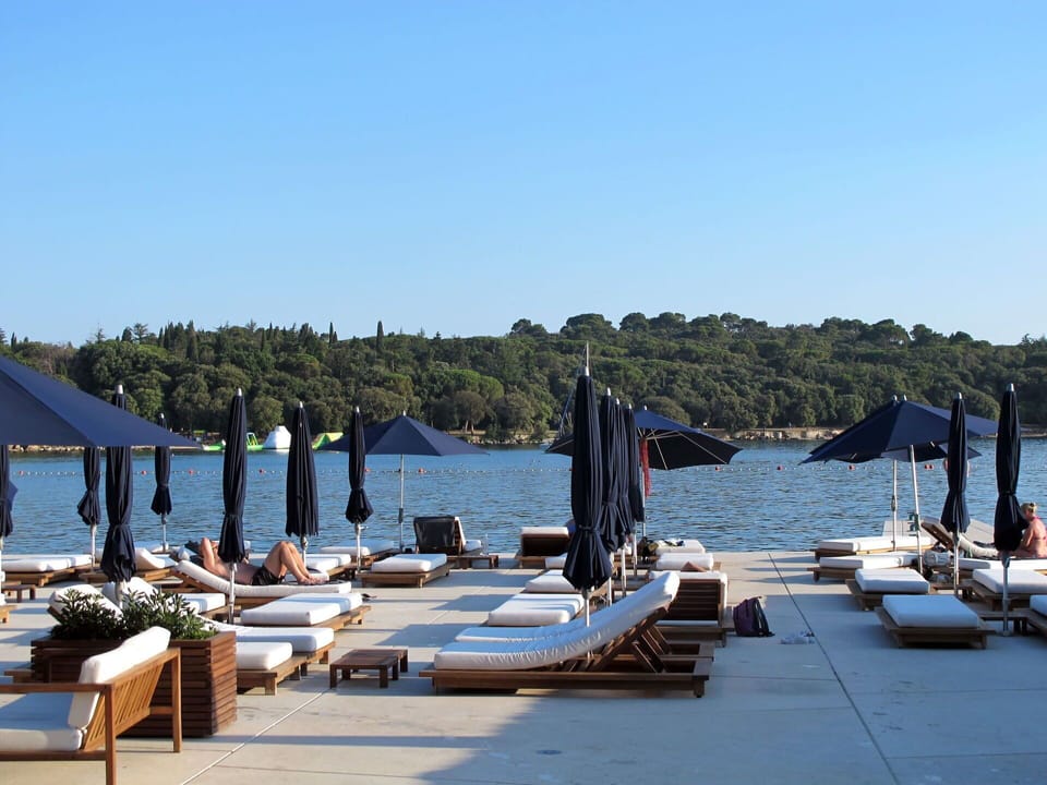 Water, Sky, Shade, Lake, Vehicle, Arecales, Dock, Tree, Outdoor Furniture, Boat
