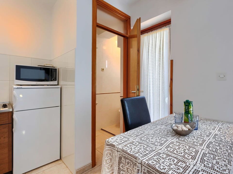 Furniture, Property, Cabinetry, Kitchen Appliance, Interior Design, Comfort, Flooring, Floor, Home Appliance, Wood