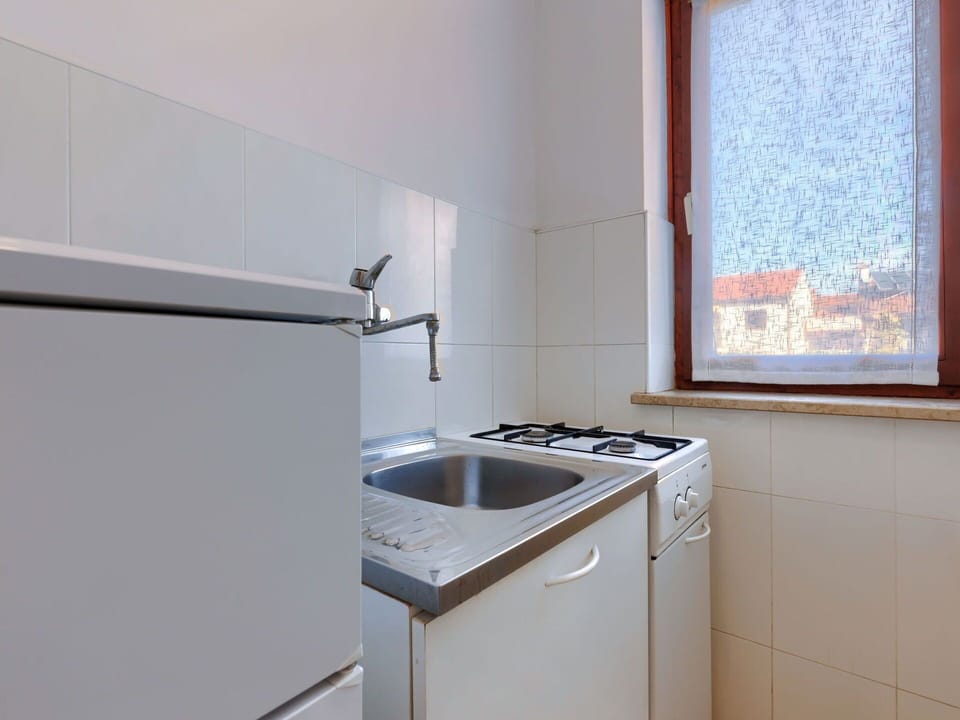 Kitchen Sink, Sink, Cabinetry, Plumbing Fixture, Window, Kitchen, Flooring, Wood, Floor