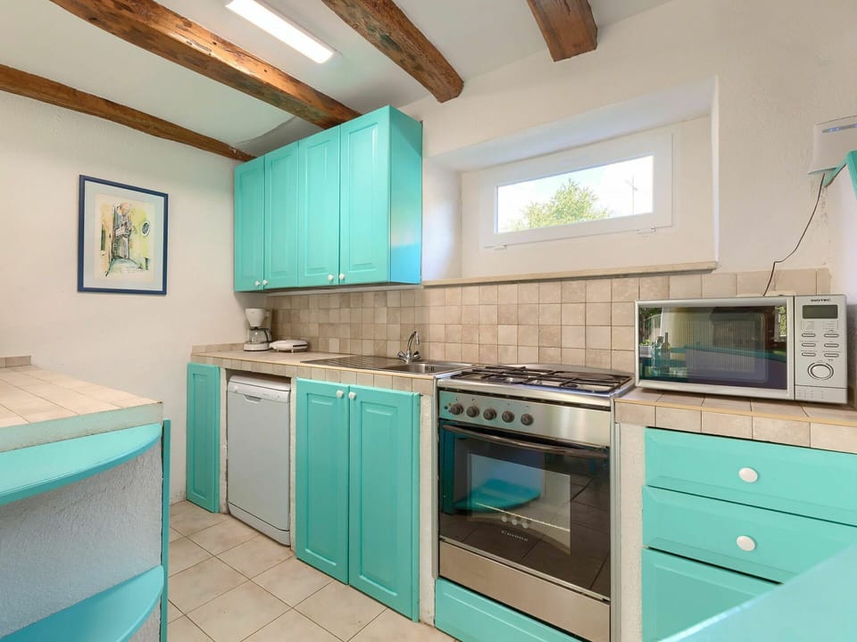 Cabinetry, Property, Countertop, Building, Drawer, Kitchen Stove, Kitchen Appliance, Kitchen, Gas Stove, Wood