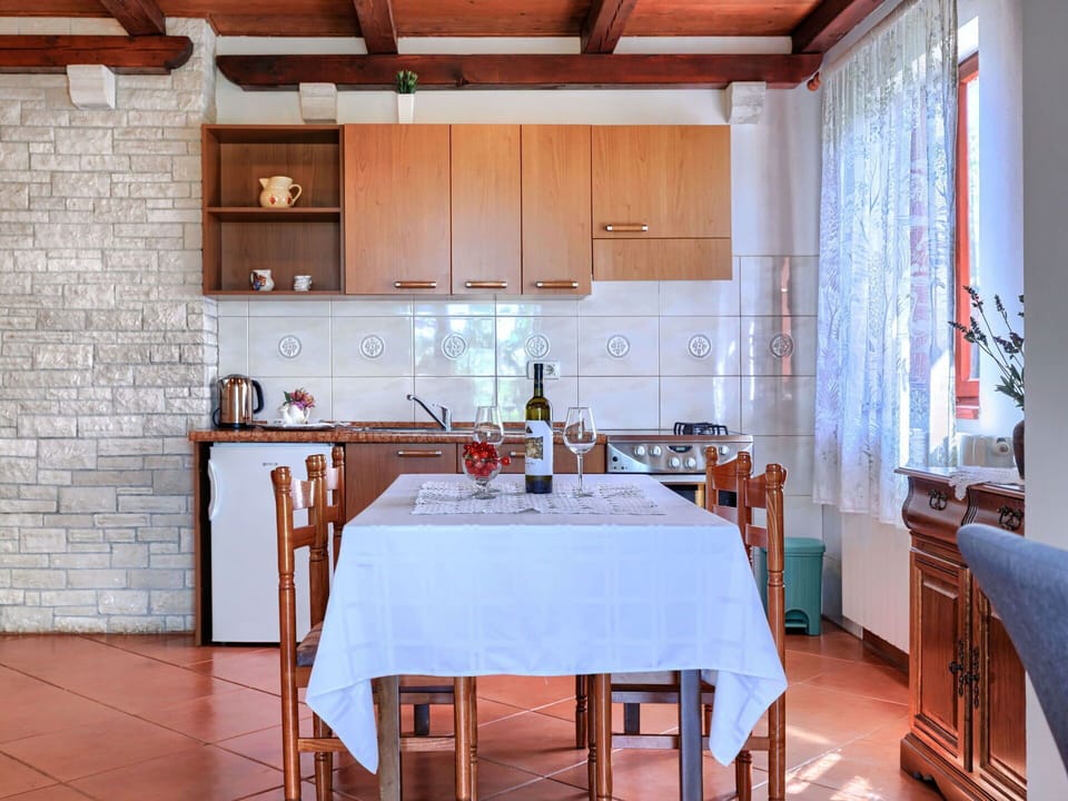 Furniture, Interior Design, Flooring, Wood, Kitchen, Ceiling, Floor, Countertop, Lighting, Cabinetry