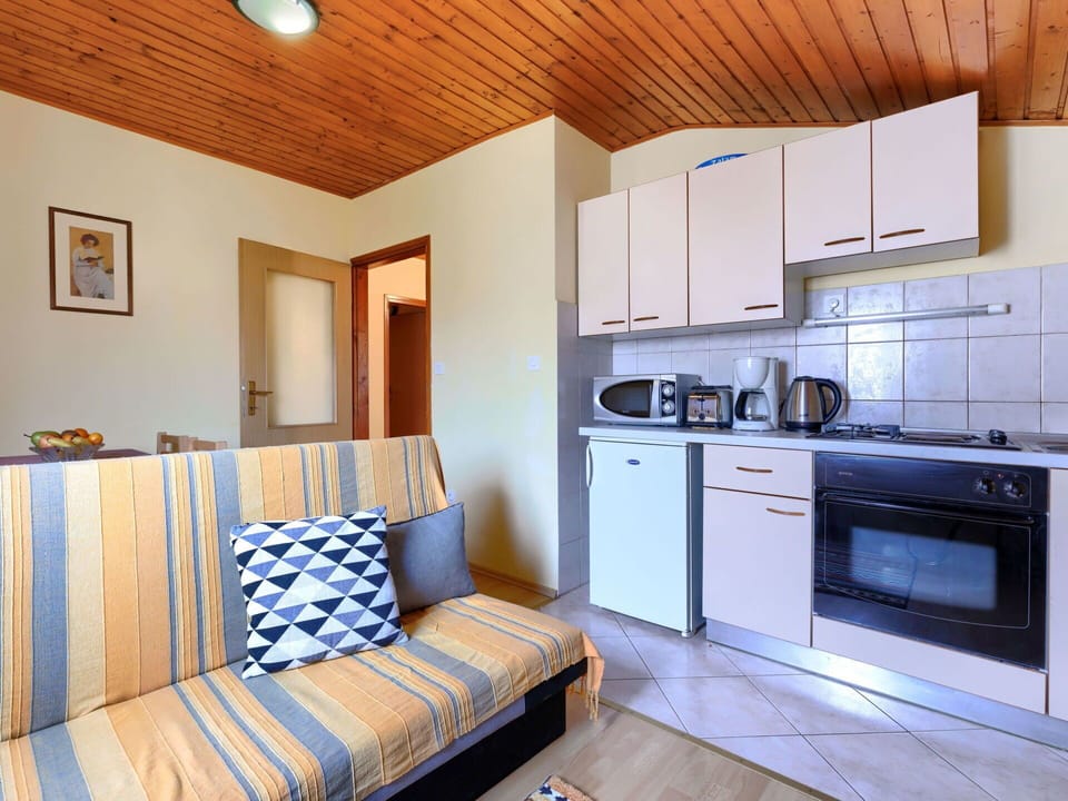 Property, Cabinetry, Furniture, Gas Stove, Wood, Comfort, Blue, Countertop, Building, Kitchen Appliance