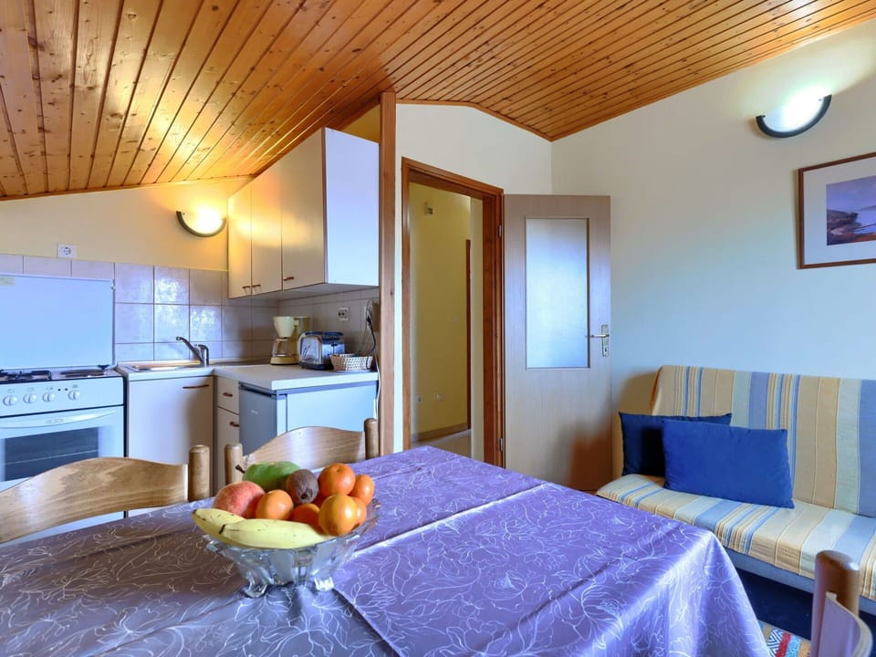 Furniture, Property, Table, Building, Azure, Countertop, Interior Design, Wood, Lighting, Cabinetry