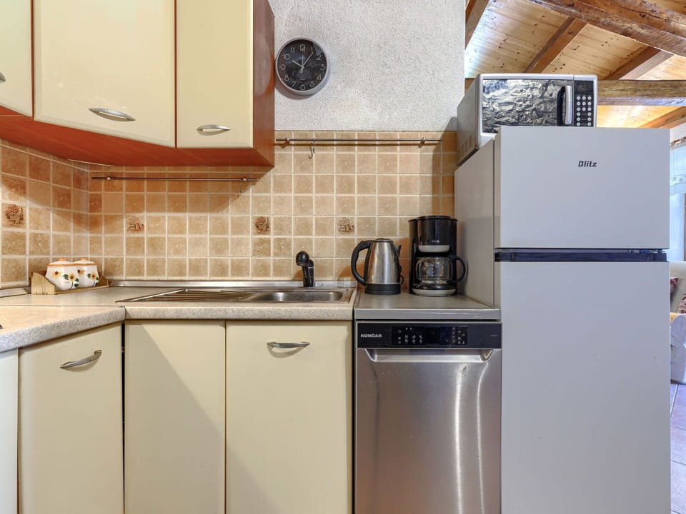 Kitchen Appliance, Kitchen, Major Appliance, Countertop, Home Appliance, Plumbing Fixture, Cabinetry, Refrigerator, Kitchen Sink, Small Appliance