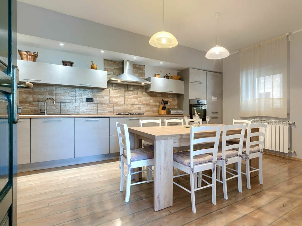 Table, Property, Furniture, Countertop, Cabinetry, Wood, Interior Design, Chair, Flooring, Floor