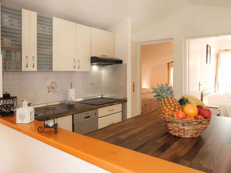 Cabinetry, Furniture, Countertop, Tap, Table, Kitchen, Kitchen Stove, Wood, Sink, Drawer