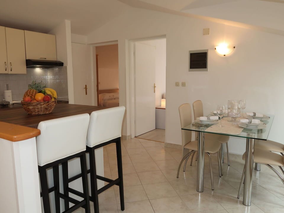 Table, Furniture, Property, Cabinetry, Chair, Countertop, Wood, Lighting, Interior Design, Floor