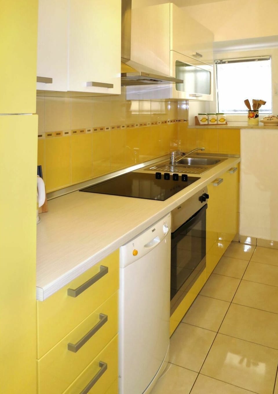 Property, Room, Kitchen, Yellow, Cabinetry, Furniture, Countertop, Interior Design, Building, House
