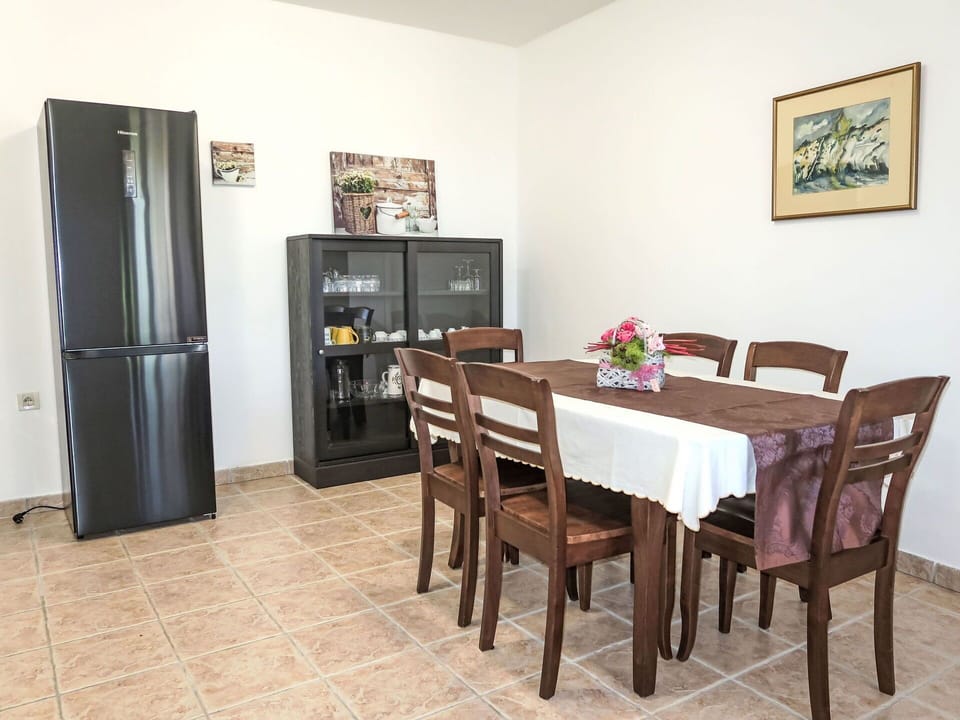 Furniture, Flooring, Interior Design, Table, Floor, Wood, Kitchen & Dining Room Table, Room, Dining Room, Chair