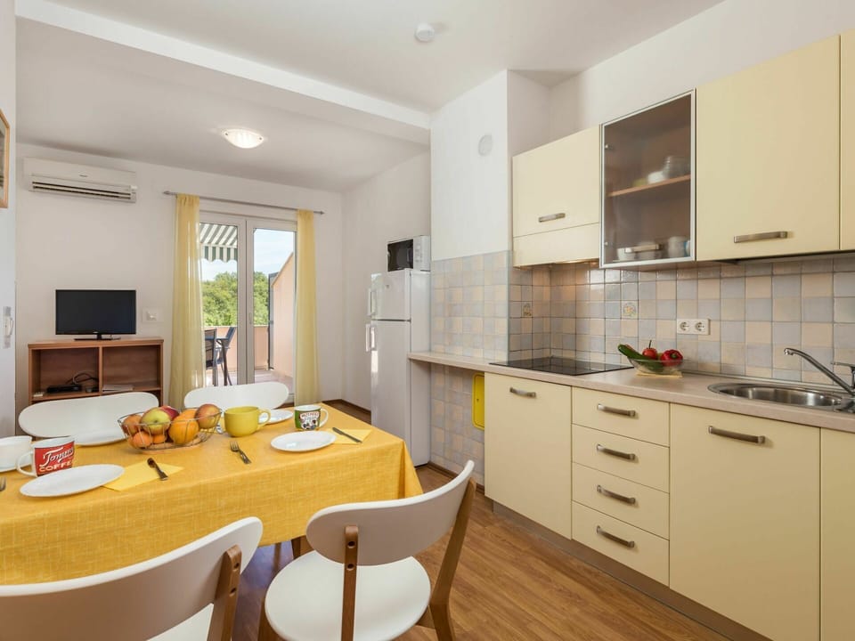 Cabinetry, Furniture, Property, Countertop, Sink, Building, Chair, Wood, Table, Interior Design