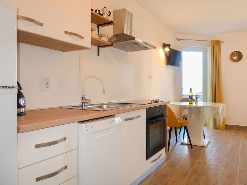 Countertop, Cabinetry, Sink, Furniture, Kitchen Sink, Tap, Wood, Kitchen, Interior Design, Lighting