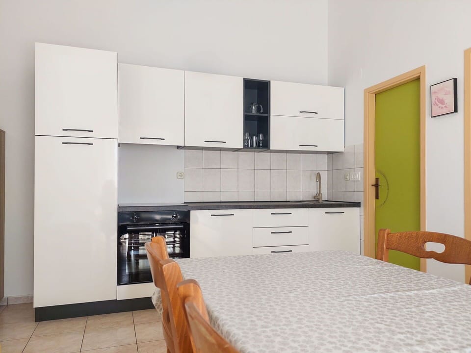 Interior Design, Wood, Flooring, Furniture, Floor, Cabinetry, Room, Countertop, Kitchen, Kitchen Appliance