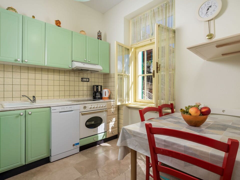Cabinetry, Property, Furniture, Countertop, Sink, Interior Design, Wood, Home Appliance, Kitchen Stove, Kitchen