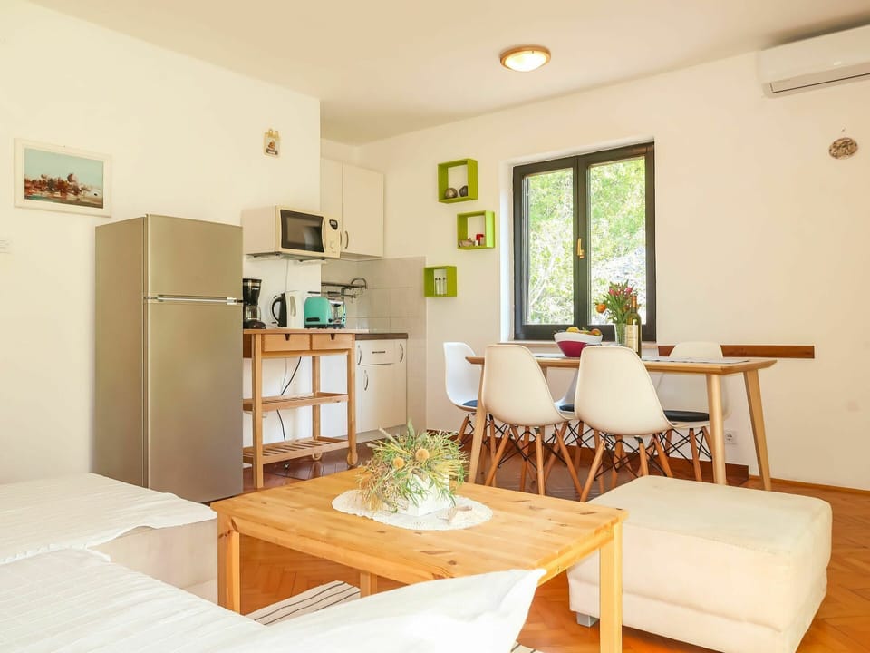 Room, Furniture, Property, Living Room, Interior Design, Building, Table, House, Yellow, Floor