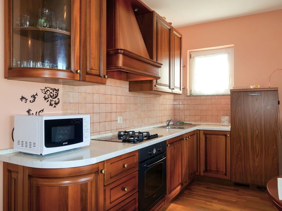 Cabinetry, Countertop, Furniture, Room, Kitchen, Property, Interior Design, Hardwood, Building, Wood Flooring