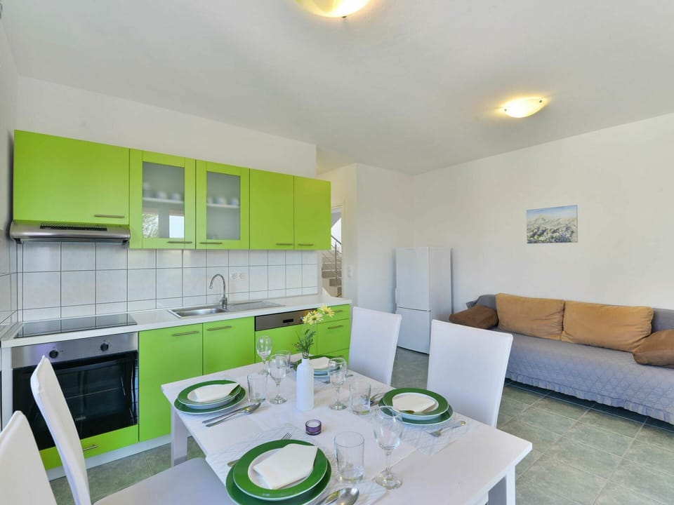 Furniture, Property, Table, Cabinetry, Green, Building, Interior Design, Tableware, Lighting, House