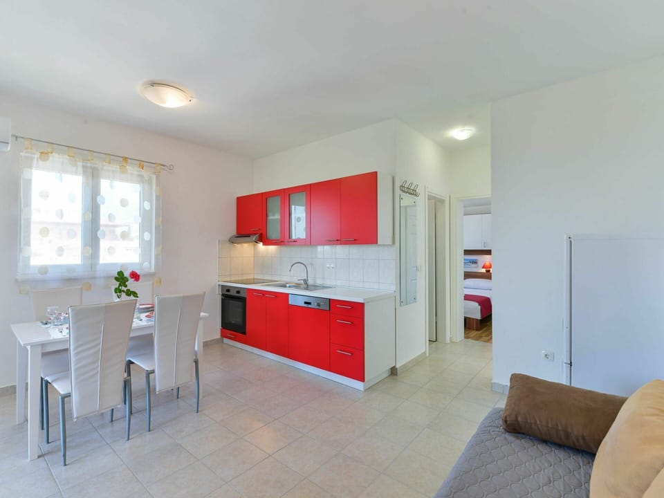 Cabinetry, Furniture, Window, Houseplant, Countertop, Building, Table, Chair, Wood, Drawer