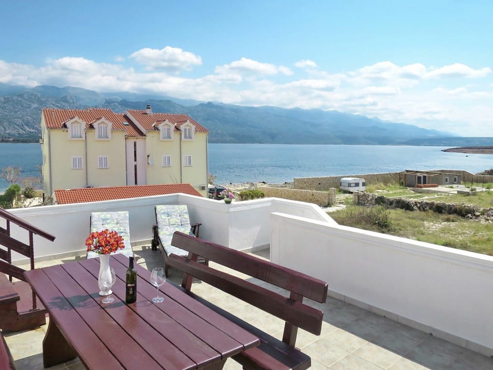 Water, Sky, Cloud, Building, Property, Mountain, Wood, Lake, Plant, Outdoor Furniture