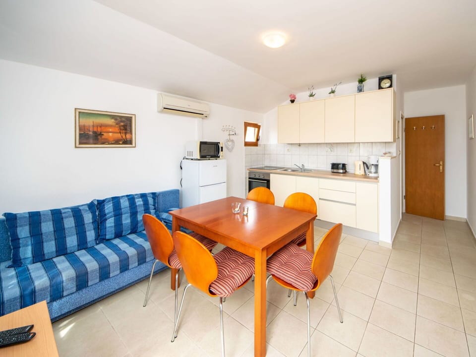Table, Furniture, Cabinetry, Countertop, Window, Orange, Couch, Chair, Wood, Kitchen & Dining Room Table