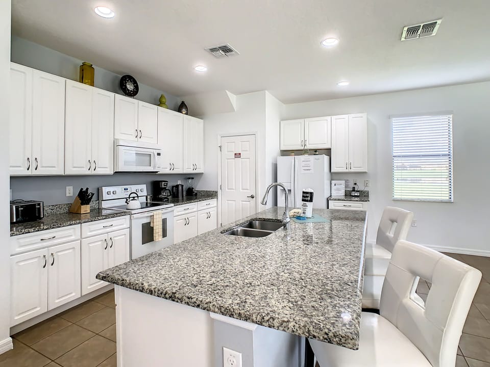 Spacious kitchen with updated appliances and a bright, open layout.
