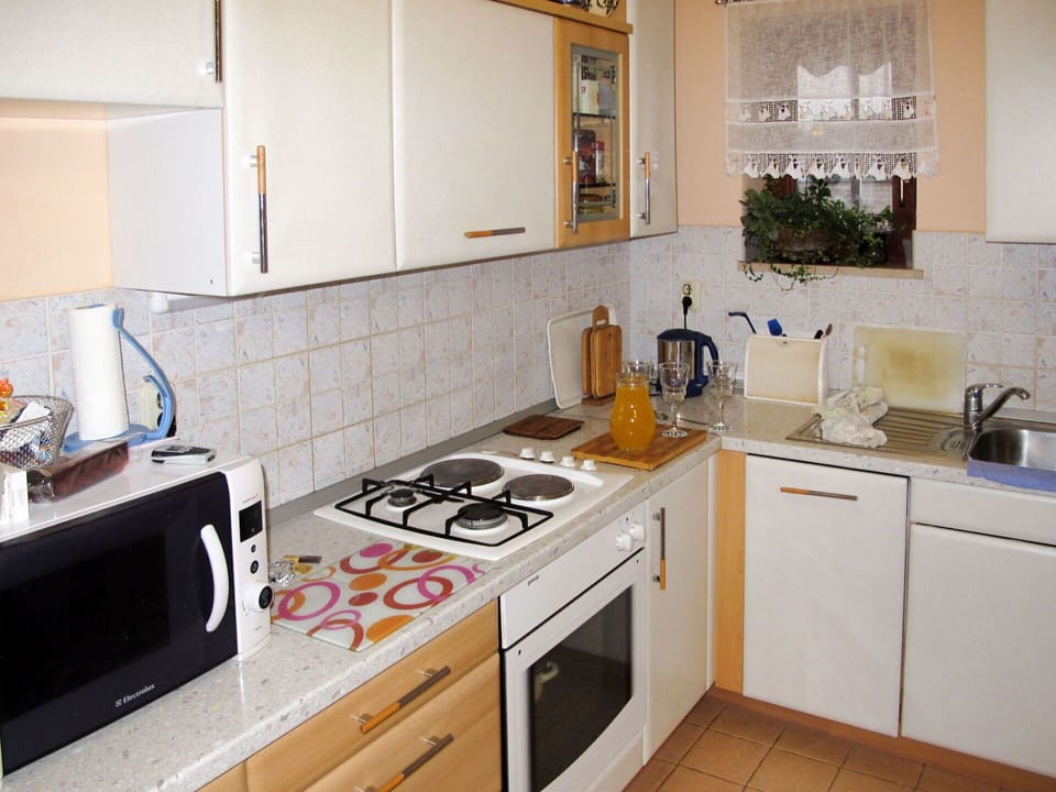 Cabinetry, Countertop, Property, Kitchen Sink, Gas Stove, Kitchen Appliance, Sink, Kitchen Stove, Cooktop, Kitchen