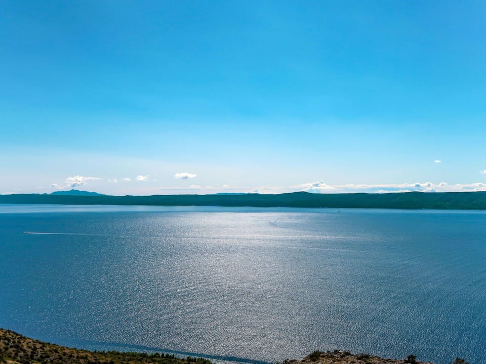 Water, Sky, Water Resources, Cloud, Blue, Natural Landscape, Highland, Coastal And Oceanic Landforms, Lake, Bank