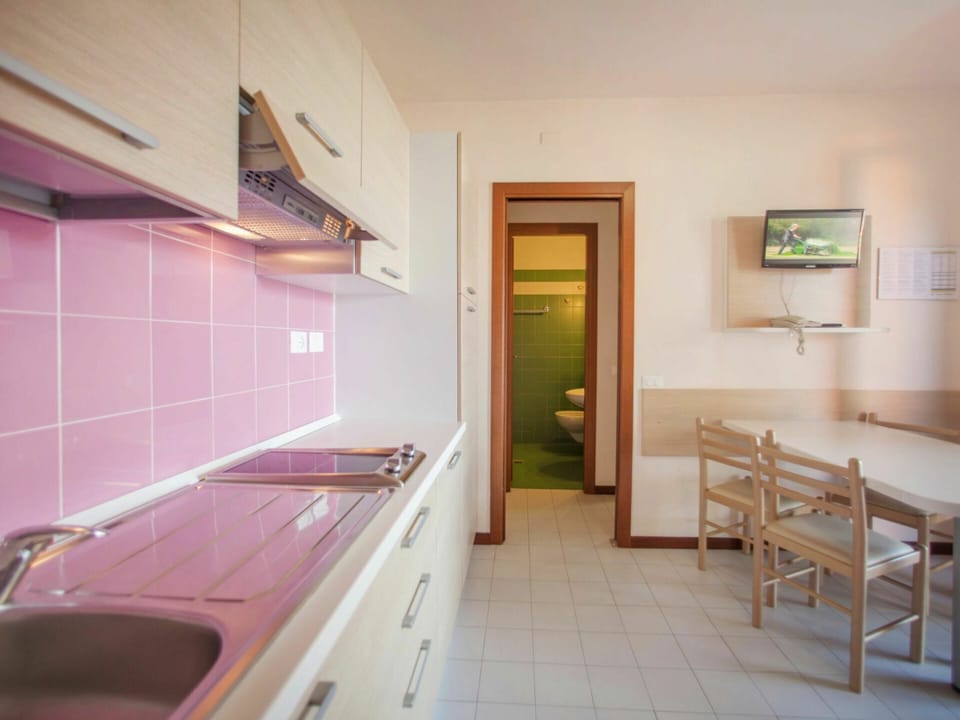 Furniture, Property, Cabinetry, Building, Countertop, Wood, Table, Picture Frame, Architecture, Interior Design