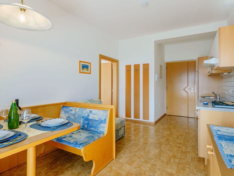 Table, Furniture, Cabinetry, Bottle, Blue, Wood, Lighting, Building, Home Appliance, Interior Design