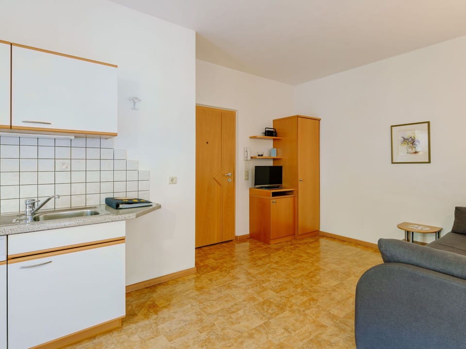 Furniture, Cabinetry, Property, Kitchen Sink, Sink, Wood, Interior Design, Countertop, Couch, Picture Frame