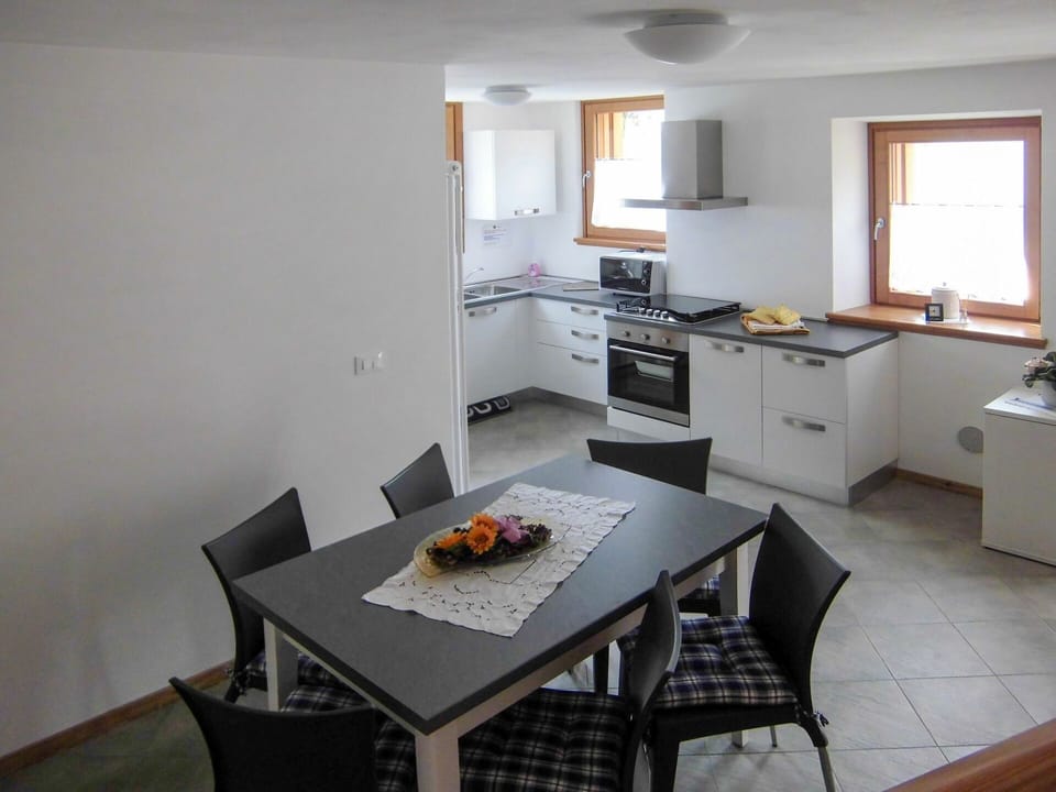 Table, Furniture, Cabinetry, Window, Sink, Chair, Countertop, Wood, Building, Kitchen