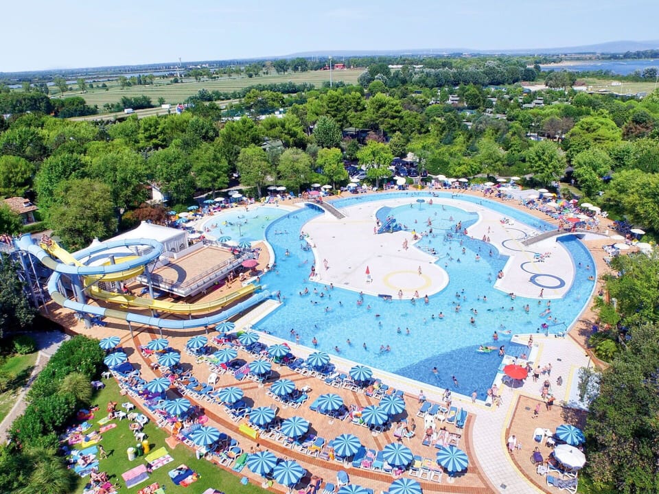 Sky, Tree, Botany, Outdoor Recreation, Urban Design, Natural Landscape, Swimming Pool, Leisure, Landscape, Recreation