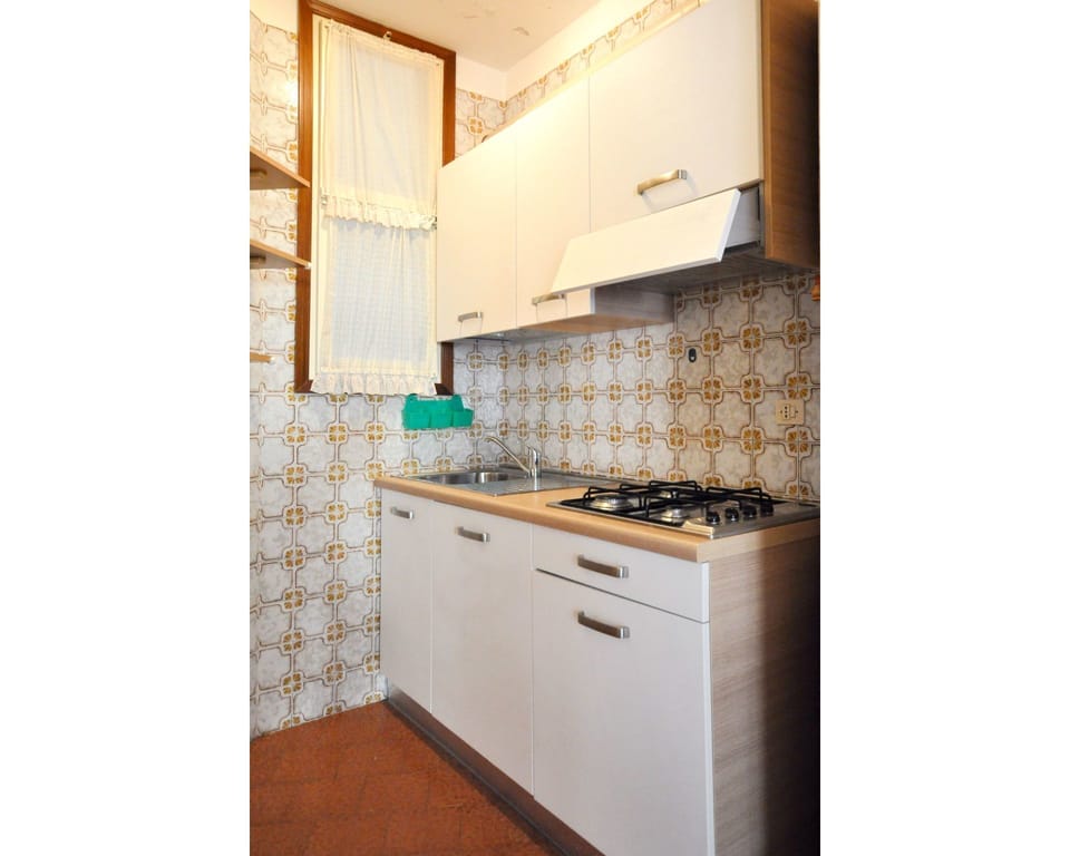 Property, Room, Kitchen, Cabinetry, Tile, Countertop, Furniture, House, Floor, Interior Design