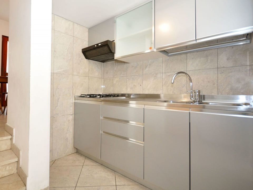 Property, Room, Tile, Cabinetry, Furniture, Countertop, Interior Design, Kitchen, Floor, Sink