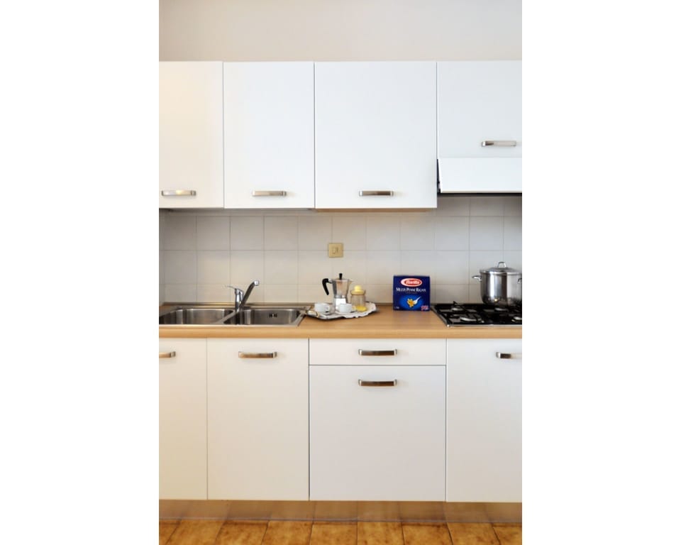 Countertop, Kitchen, Room, Property, Cabinetry, Furniture, Floor, Interior Design, House, Tile