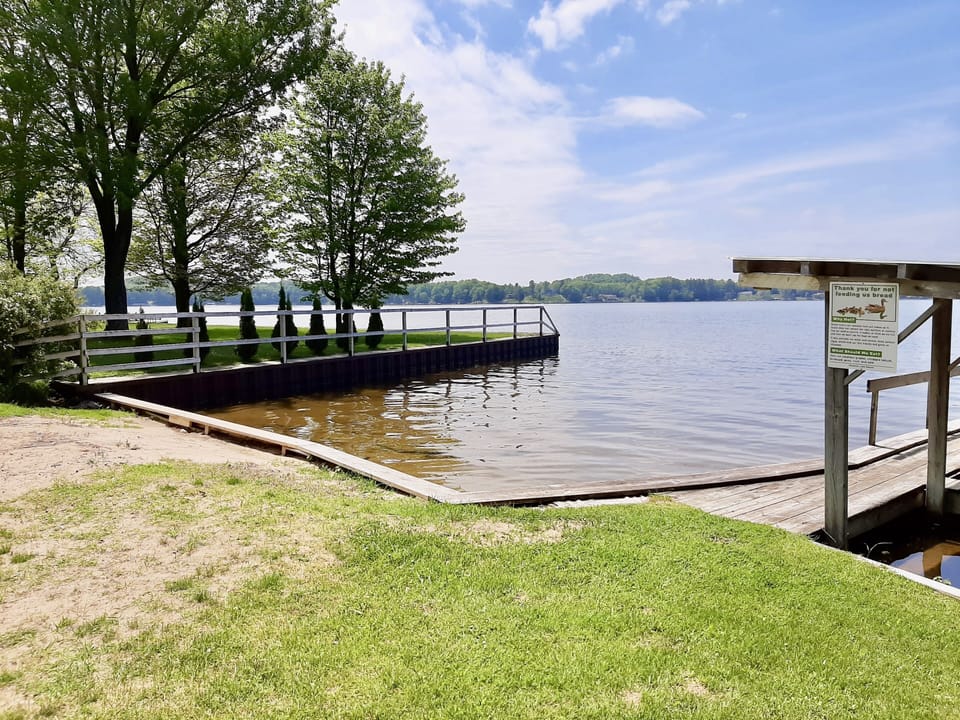 Swim area has sandy bottom and is protected on 3 sides.