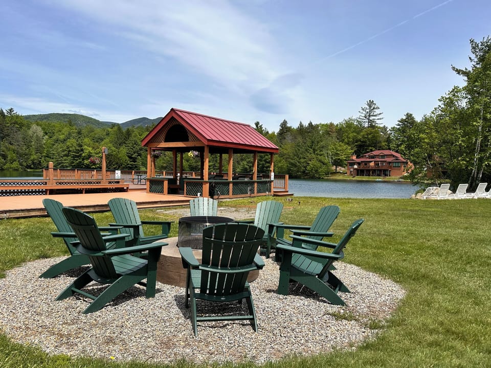Firepit, covered deck area with grills and room for  larger groups to hang out.