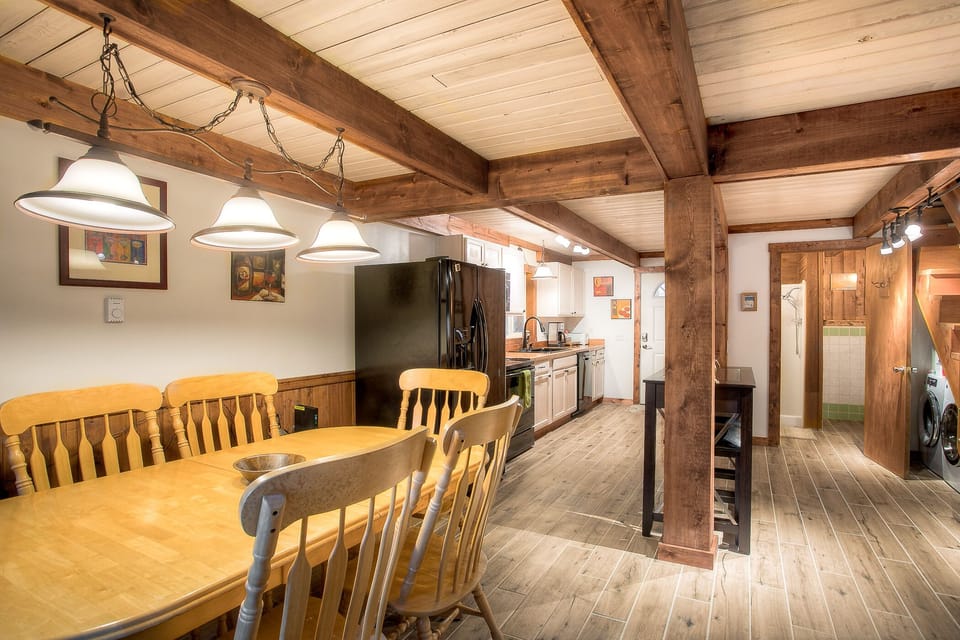 Seating for 6 around the table. Bathroom can be seen just beside the stairs