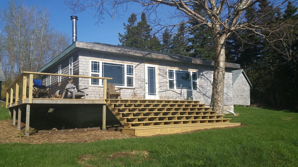 Large over sized deck with views of the bay & beach!