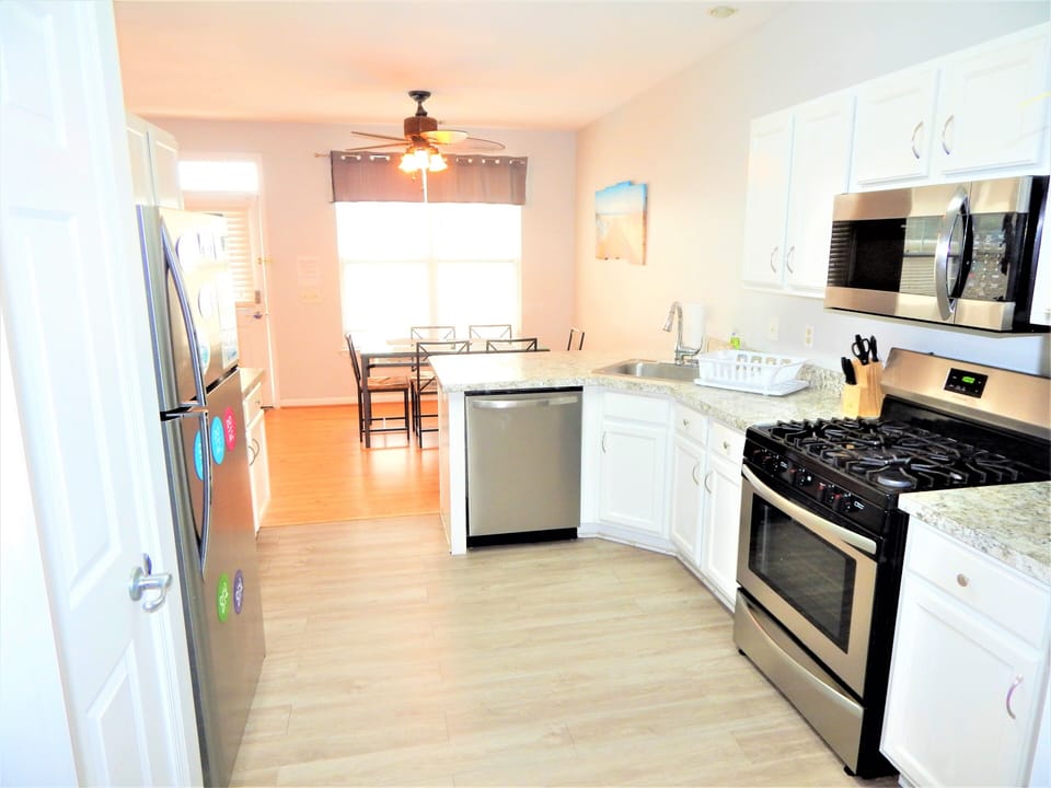 1st floor: open concept kitchen to dining area