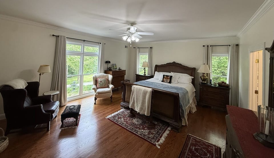 King size bed, comfortable seating, dresser, and lots of space