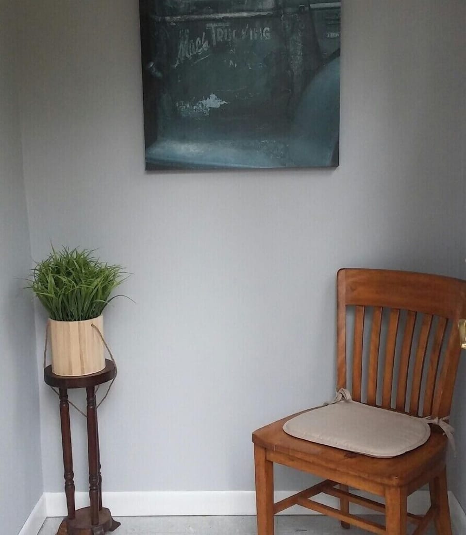 Back porch for outdoor items such as fishing poles and snowmobile clothing etc 