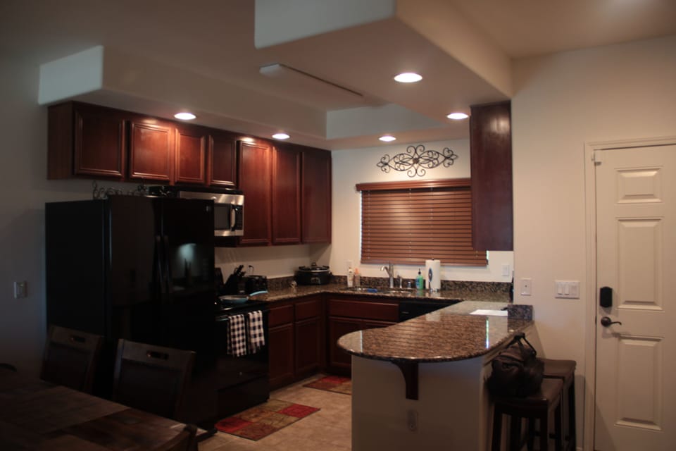 Kitchen just inside front door. 