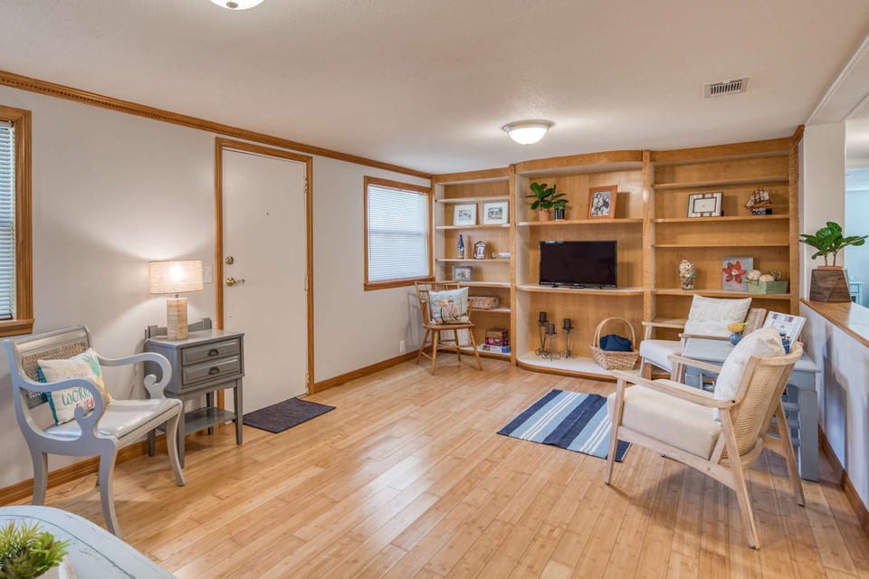 This home features two living spaces, both are outfitted with a TV.