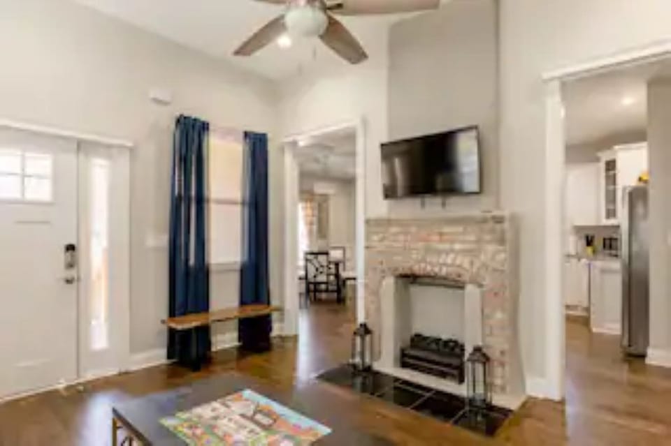 Spacious living room area with fast WiFi and smart TV.