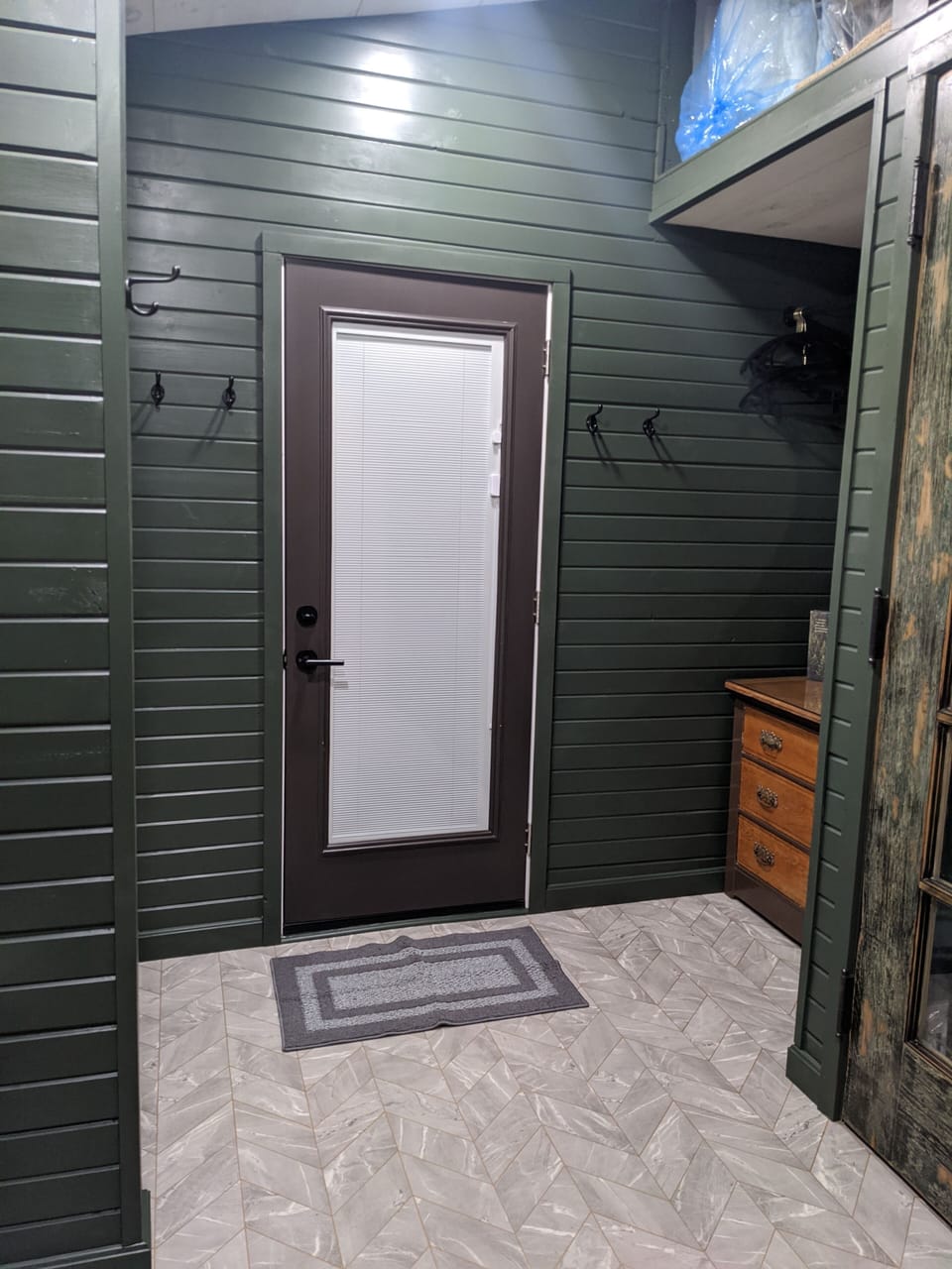 Newly remodeled bathroom Feb 2022. Door leads outside to the new hot tub.