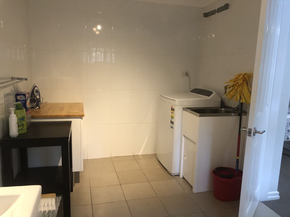 Washing machine and soap, iron provided. 