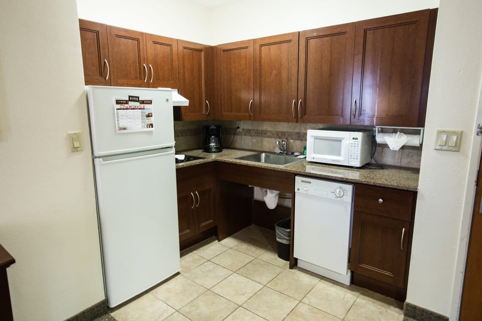 The fully-equipped kitchen features all the amenities you'd need to make a delicious meal.
